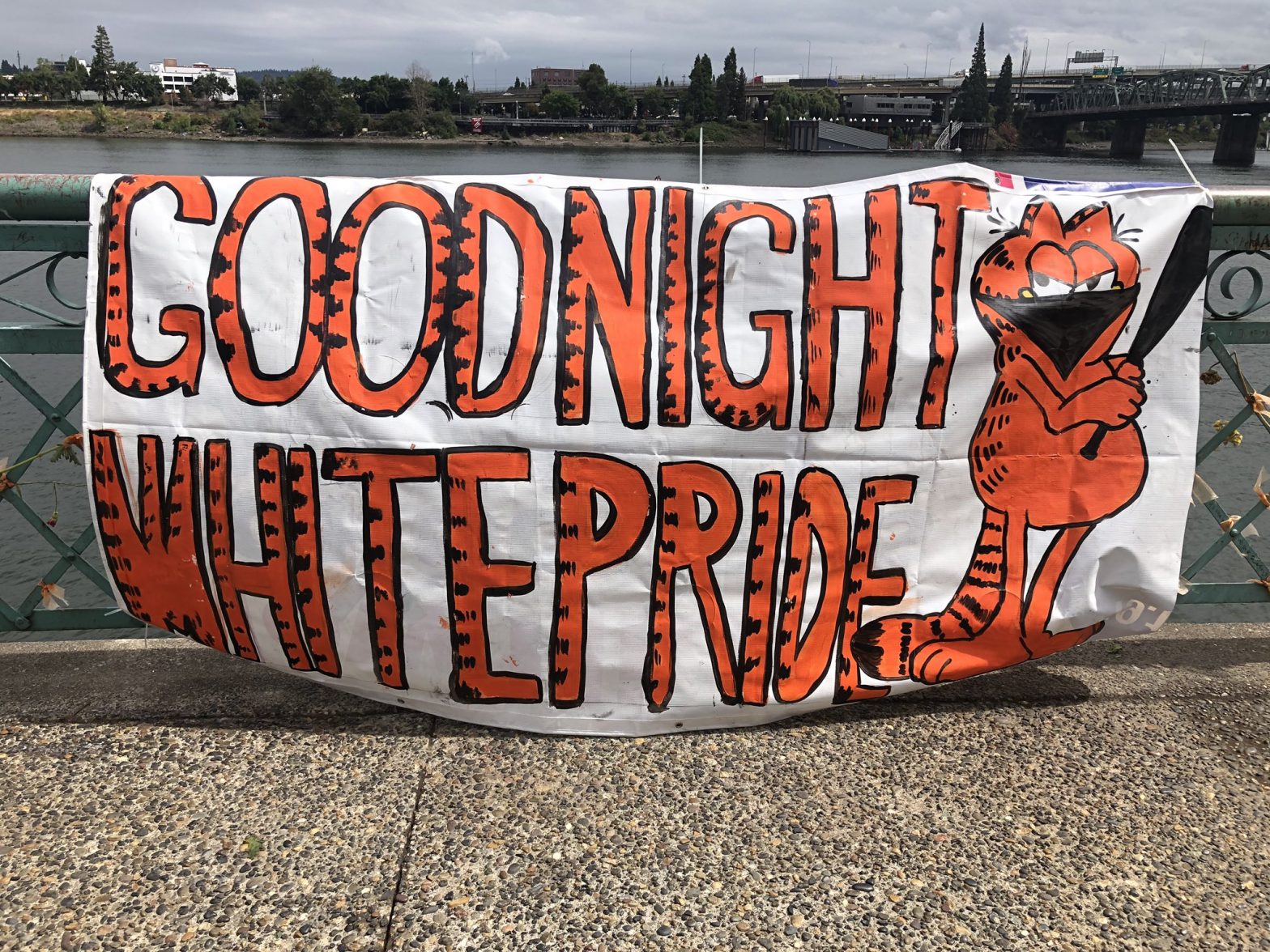 Banner with Garfield holding a bat, reads "Goodnight White Pride"